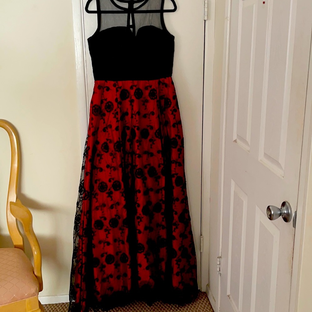 Black evening dress lined up with red